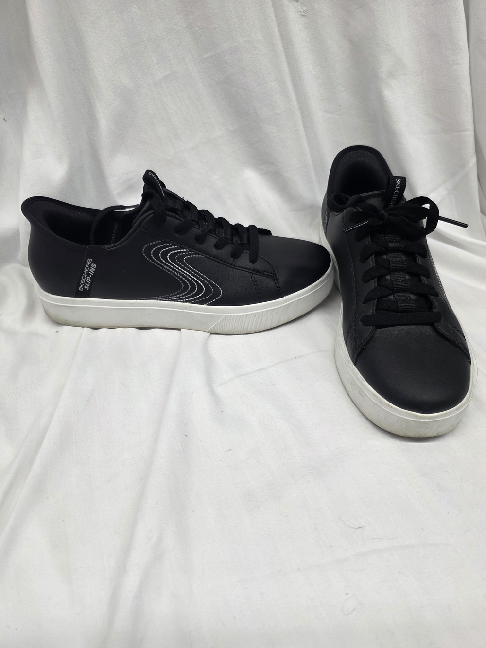 Skechers Black Low-Top Sneakers with White Sole